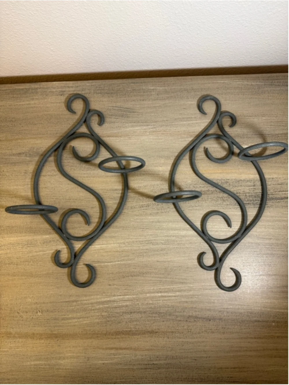 set of two scrollwork metal wall sconces approx 13x9”